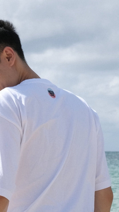 DISSOLVE IN THE WAVE TEE